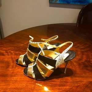 Gorgeous Nicholas Kirkwood Black patent leather, gold, and snakeskin heels.